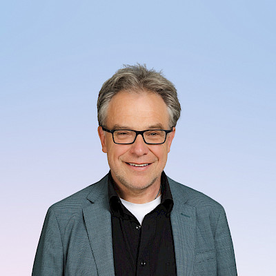 Portrait-Foto von Dr. Norbert Dennerlein